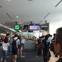Photo taken at Gate 59 by A T. on 8/2/2015