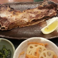 Photo taken at 焼魚食堂 魚角 経堂店 by T C. on 7/5/2013
