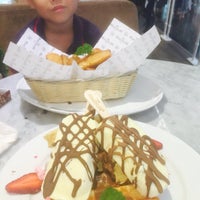 Photo taken at Magnum Café by OREO on 8/2/2015