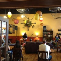 Photo taken at Solid Grounds Coffee House by Aaron B. on 6/29/2013