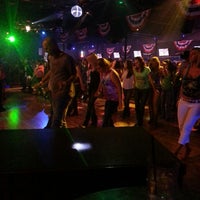 Photo taken at Buck Wild Country Dance Hall by Christy H. on 5/12/2013