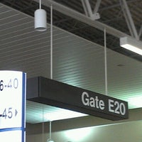 Photo taken at Gate E20 by Marlene M. on 9/28/2012