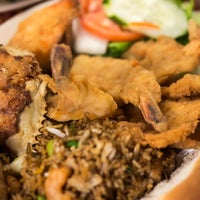 Das Foto wurde bei Mambo Seafood von Mambo Seafood am 10/6/2014 aufgenommen