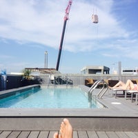 Photo taken at Yale West Rooftop Pool by Brian L. on 8/15/2015