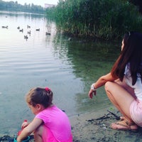 Photo taken at Верхнє Вигурівське озеро by Kristina Z. on 9/5/2016