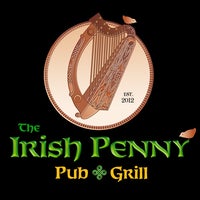 Photo taken at The Irish Penny Pub &amp;amp; Grill by Jeff T. on 12/29/2012