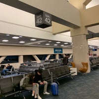 Photo taken at Gate C4 by Axel L. on 12/11/2018