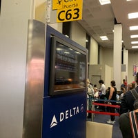Photo taken at Gate C63 by Axel L. on 8/8/2019
