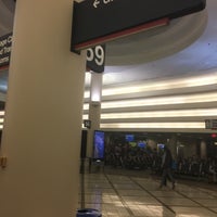 Photo taken at Gate 57 by Axel L. on 8/4/2017