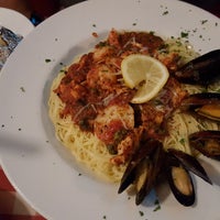 Photo taken at Naples Restaurant by Katie K. on 1/1/2016