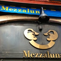 Photo taken at Mezzaluna Restaurants by The Corcoran Group on 7/9/2013