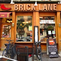 Photo taken at Brick Lane Curry House by The Corcoran Group on 7/1/2013