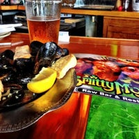Photo taken at Smitty Mcgee&amp;#39;s Raw Bar &amp;amp; Restaurant by David F. on 7/3/2013