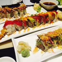 Photo taken at Ocean Blue Sushi Club by Yue P. on 12/13/2014
