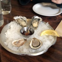 Photo taken at Muddy Waters Oyster Bar by Jackie Y. on 4/27/2019