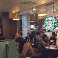 Photo taken at Starbucks by Александра П. on 1/3/2015