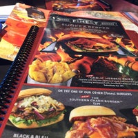 Photo taken at Red Robin Gourmet Burgers and Brews by Em C. on 2/15/2015