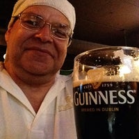 Photo taken at Tigin Irish Pub by Bob T. on 8/23/2015