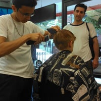 Photo taken at George&amp;#39;s Barber Shop by Betsy E. on 8/11/2013