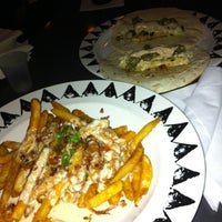 Photo taken at Bojangles Bar &amp;amp; Eatery by Chrissy F. on 12/15/2012