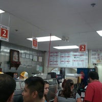 Photo taken at King Taco Restaurant by Louis M. on 9/23/2012