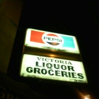 Photo taken at Victoria Liquor &amp;amp; Groceries by Monica M. on 2/14/2013