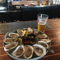 Photo taken at Mine Oyster Restaurant &amp;amp; Raw Bar by lee u. on 5/19/2019