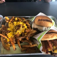 Photo taken at BurgerFi by Ashley W. on 4/6/2019