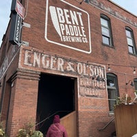 Photo taken at Bent Paddle Brewing by Carolyn A. on 3/4/2023