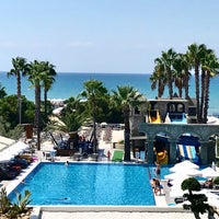 Photo taken at Thalia Beach Resort by İzzet Ü. on 8/27/2018