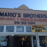 Photo taken at Mario&amp;#39;s Brothers Mini Market by Tobias on 11/10/2013
