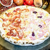 Photo taken at Fabbrica Di Pizza by Fabbrica Di Pizza on 3/31/2015