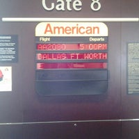Photo taken at Gate 8 by Michael E. on 3/12/2012