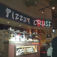 Photo taken at Crust Pizza &amp;amp; Wine Cafe by Christopher K. on 8/9/2012