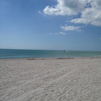 Photo taken at Beach at Carlouel Yacht Club by Trace M. on 4/15/2012