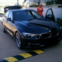 Photo taken at Momentum BMW by Steven K. on 8/1/2012