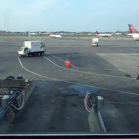 Photo taken at Gate C20 by Jimmy W. on 7/16/2012