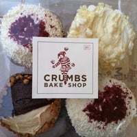 Photo taken at Crumbs Bake Shop by John Carlos on 2/14/2012