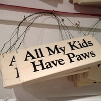 Photo taken at Paws Pet Boutique by Kate on 6/27/2012