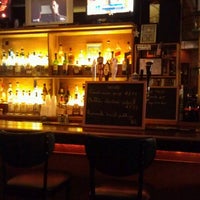Photo taken at Lamp Post Bar &amp;amp; Grille by Greg G. on 7/31/2012