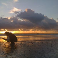 Photo taken at Huntington Dog Beach by John K. on 12/23/2010