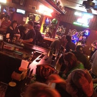Photo taken at The Dog House Saloon by Christine L. on 3/18/2012