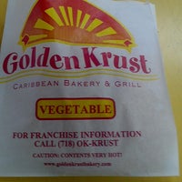 Photo taken at Golden Krust Caribbean Restaurant by Ben B. on 7/31/2012