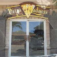 Photo taken at Pizza Madness by Janice Araki L. on 1/27/2012