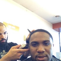 Photo taken at Royal Roots Barbershop by Chris A. on 1/28/2012