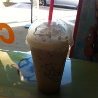 Photo taken at Maui Wowi Hawaiian Coffees &amp;amp; Smoothies by Kate C. on 8/4/2011