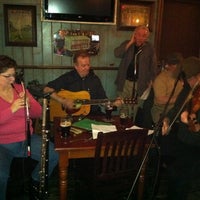 Photo taken at Dubh Linn Square Irish Pub by Stacey W. on 4/1/2012