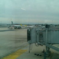 Photo taken at Gate A48 by Laura L. on 4/29/2012