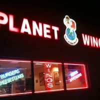 Photo taken at Planet Wings by Natalie G. on 9/9/2011
