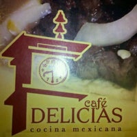 Photo taken at Delicias Cafe by C V. on 1/1/2012